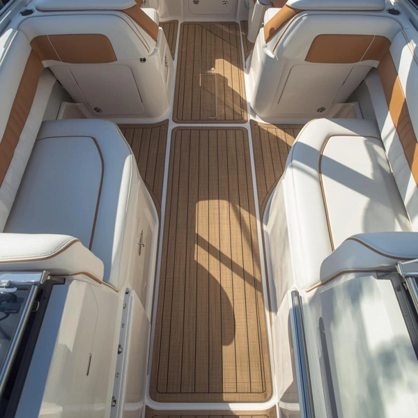 Tan teak-style woven nylon marine carpet in a luxury boat cockpit.