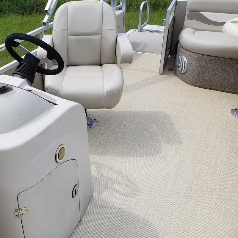 Tan woven vinyl flooring on a pontoon boat